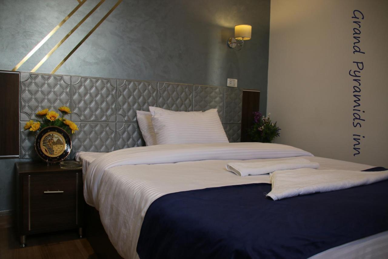 Grand Pyramids Inn Kafrat al Jabal Exterior photo